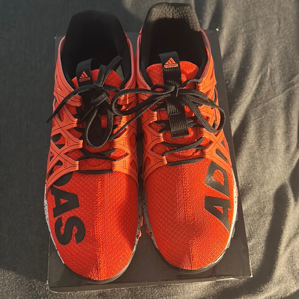 Orange adidas vigor bounce